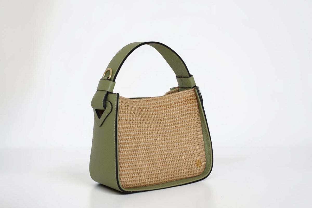 Affinée Élan Lemon handbag, three-quarter view showing the woven panel and leather side