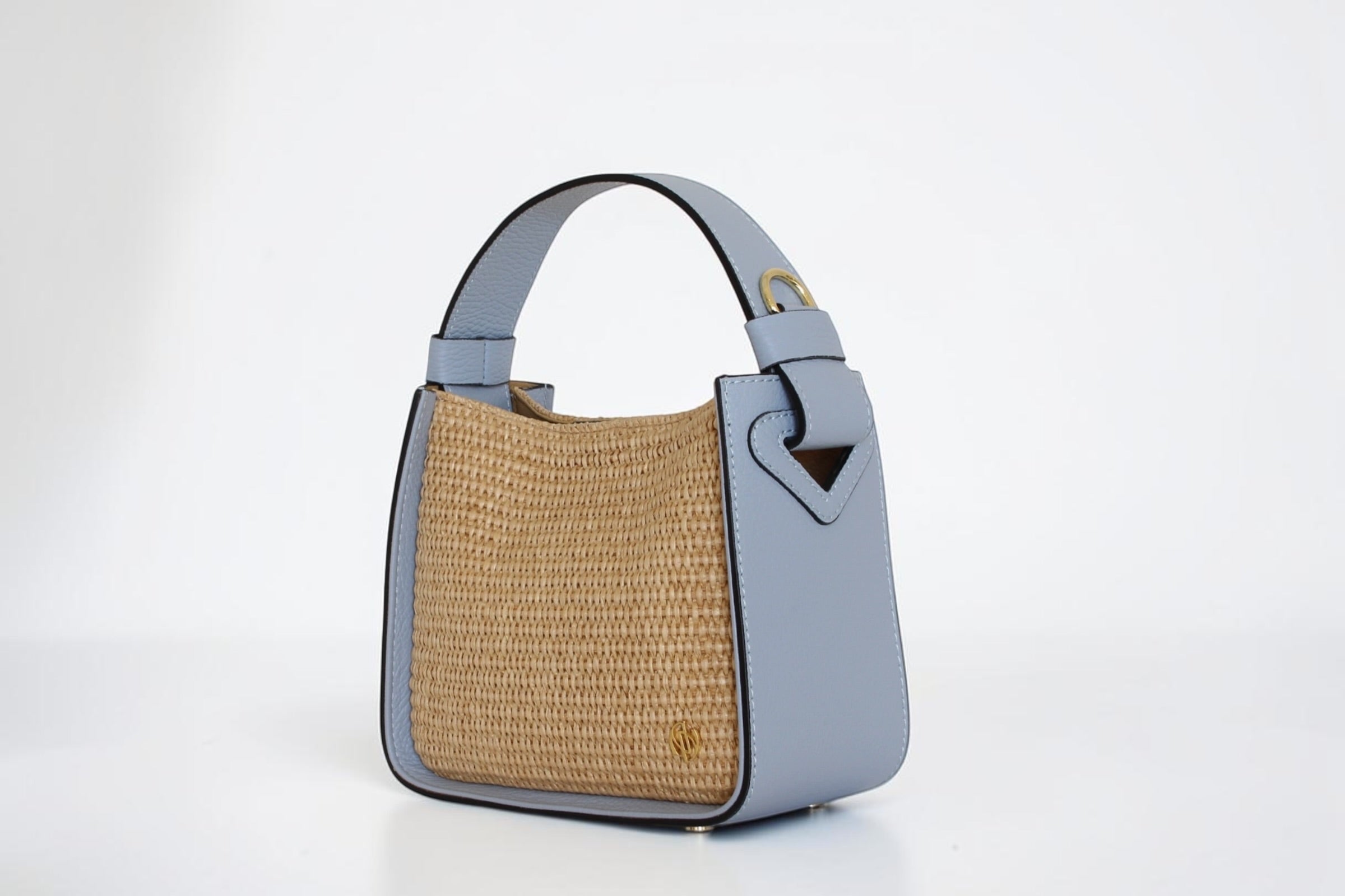 Affinée Élan Sea handbag, three-quarter view of the woven and leather construction