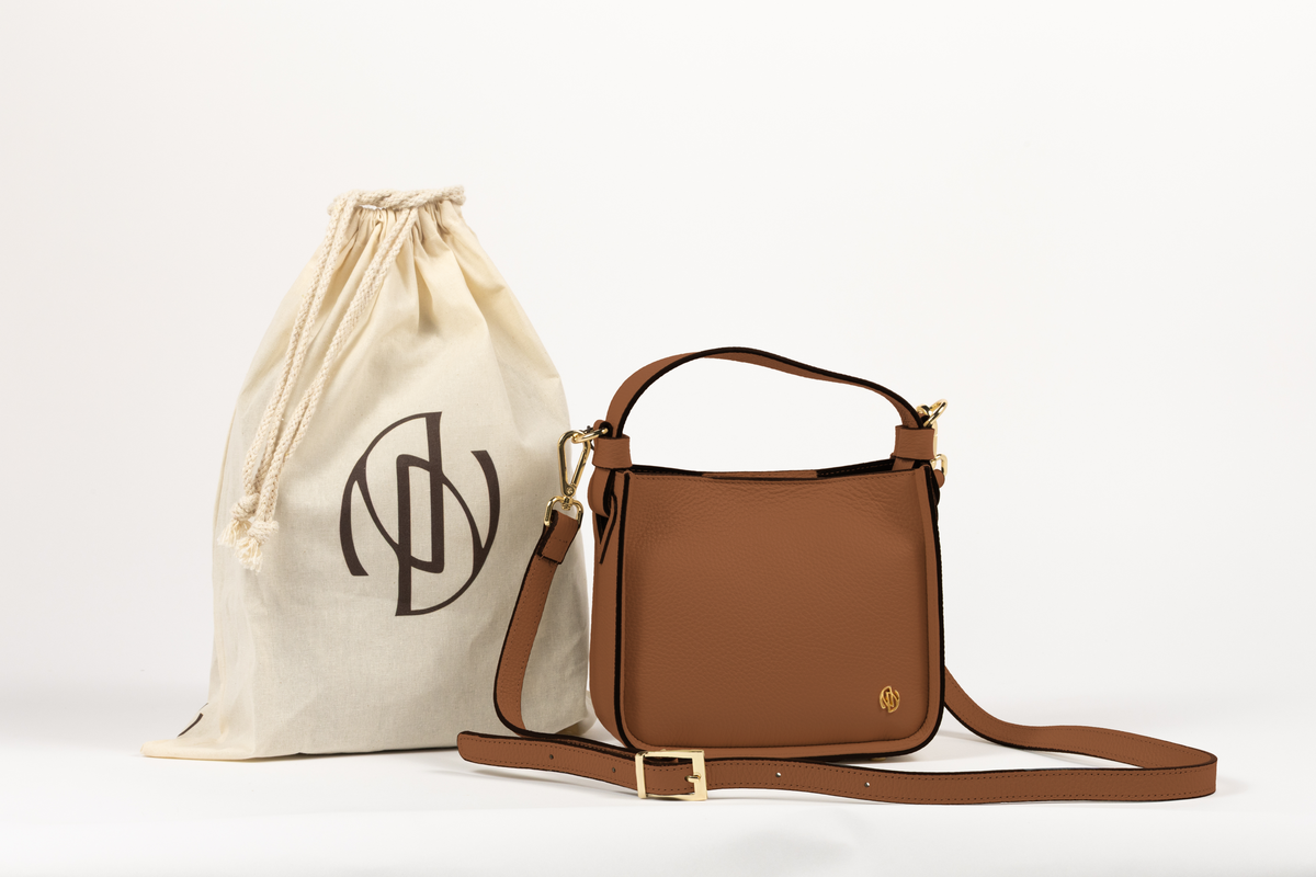 Affinée Élan Caramel handbag, with the branded dust bag and shoulder strap