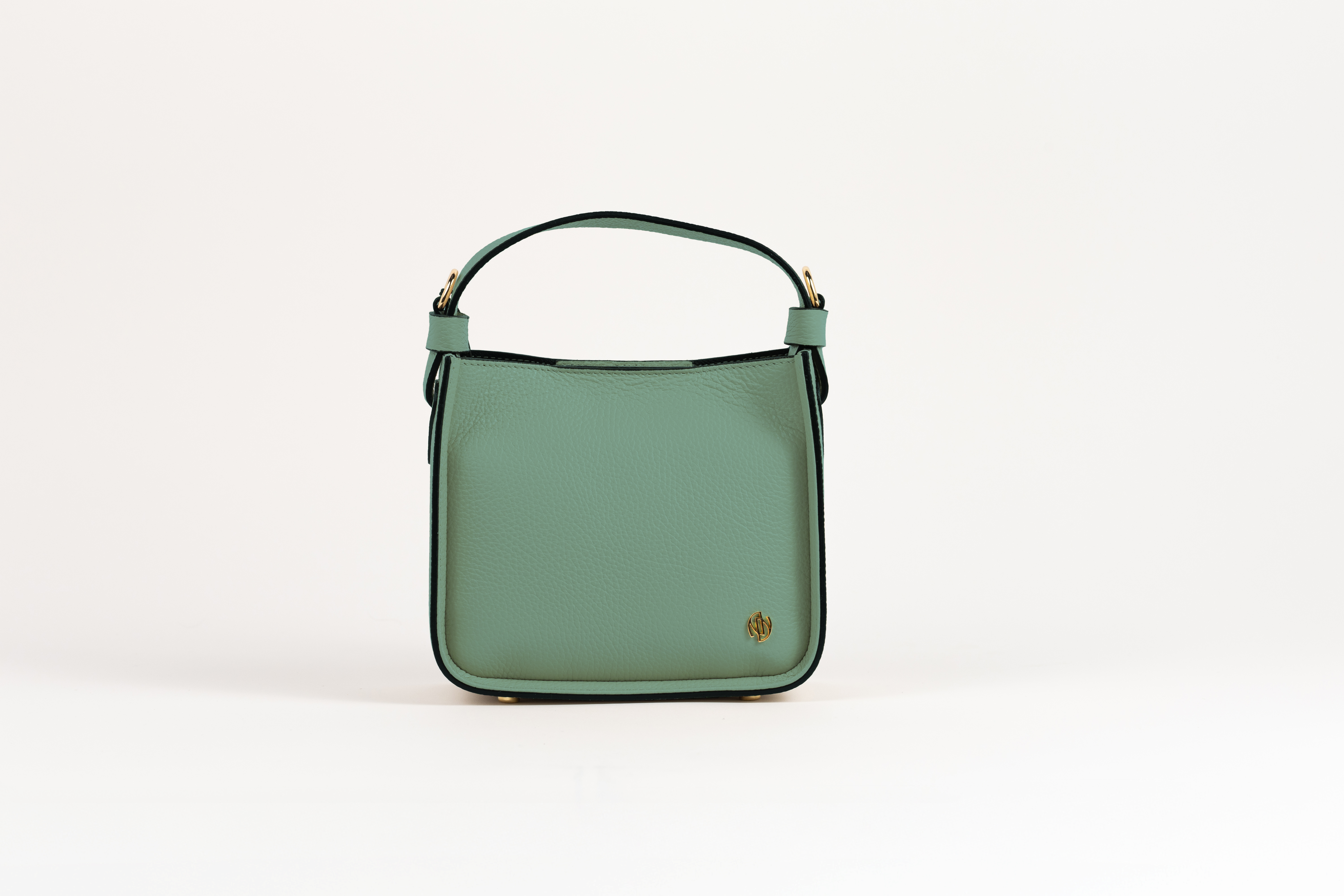 Affinée Élan Mint handbag, straight front view with gold-tone monogram