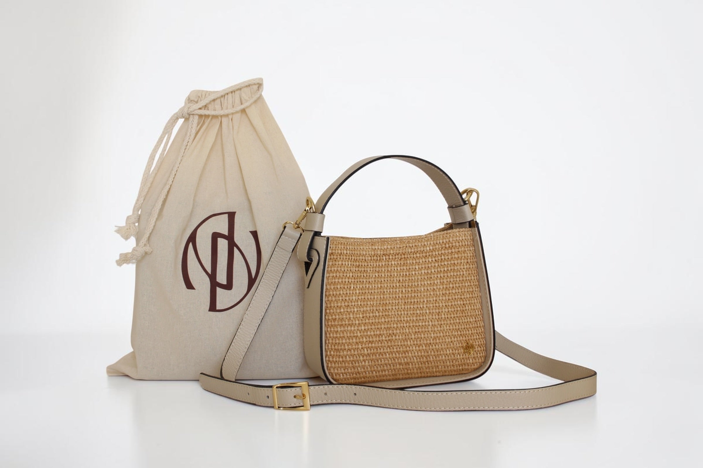 Affinée Élan Ivory handbag, packaging arrangement with dust bag and shoulder strap