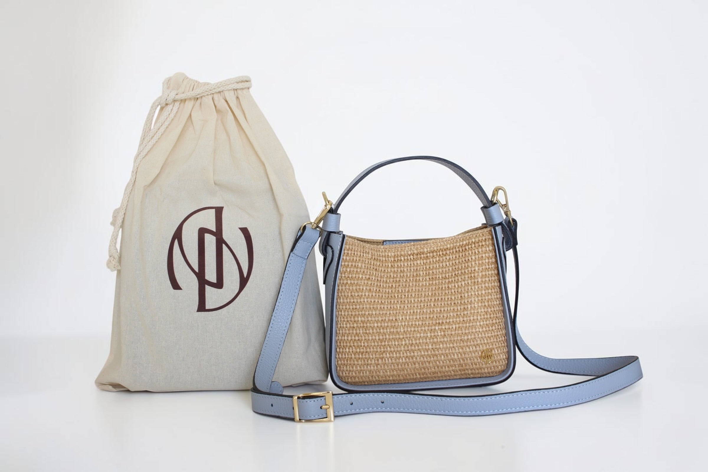 Affinée Élan Sea handbag, with the branded dust bag and shoulder strap