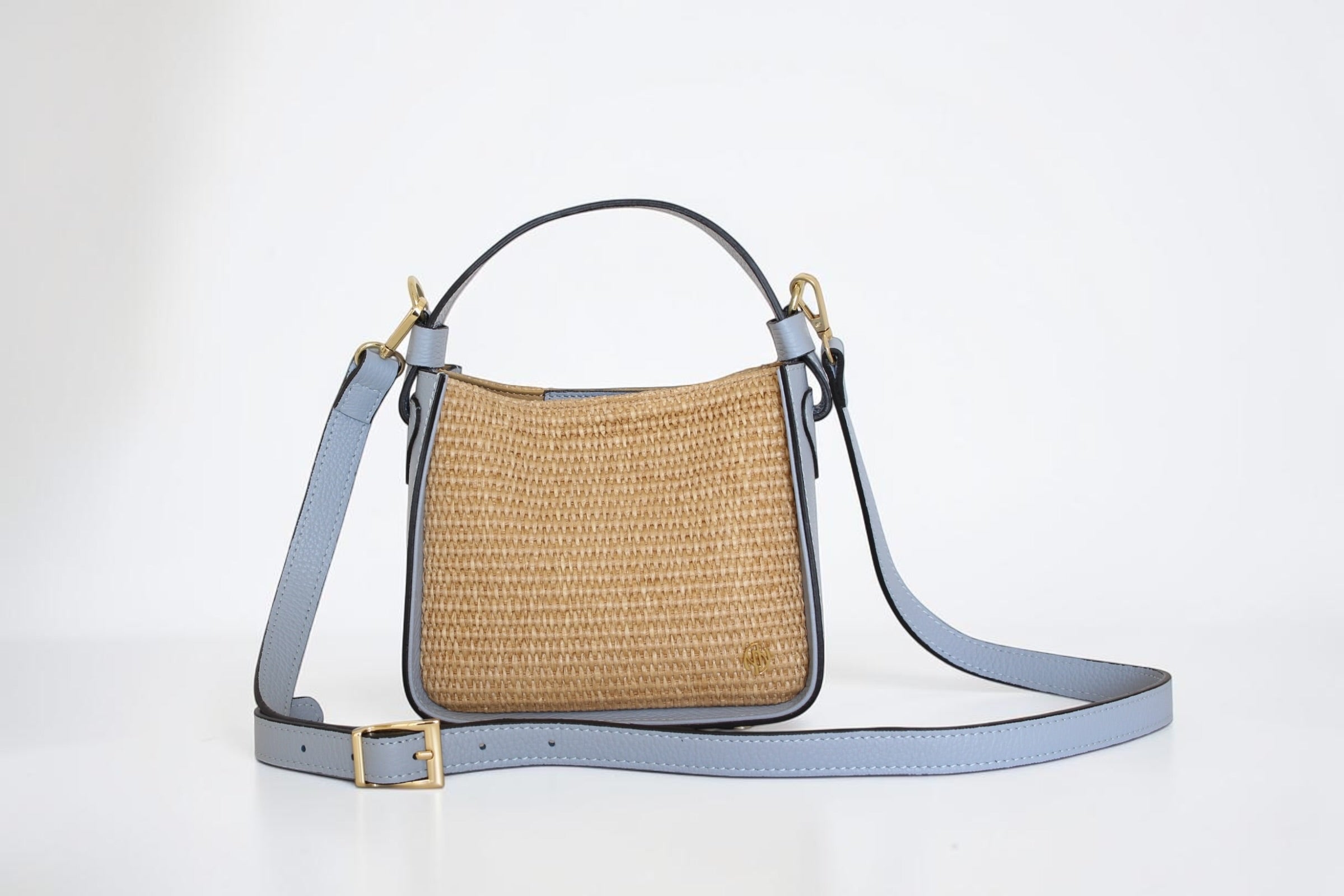 Affinée Élan Sea handbag, woven panel with the adjustable shoulder strap extended
