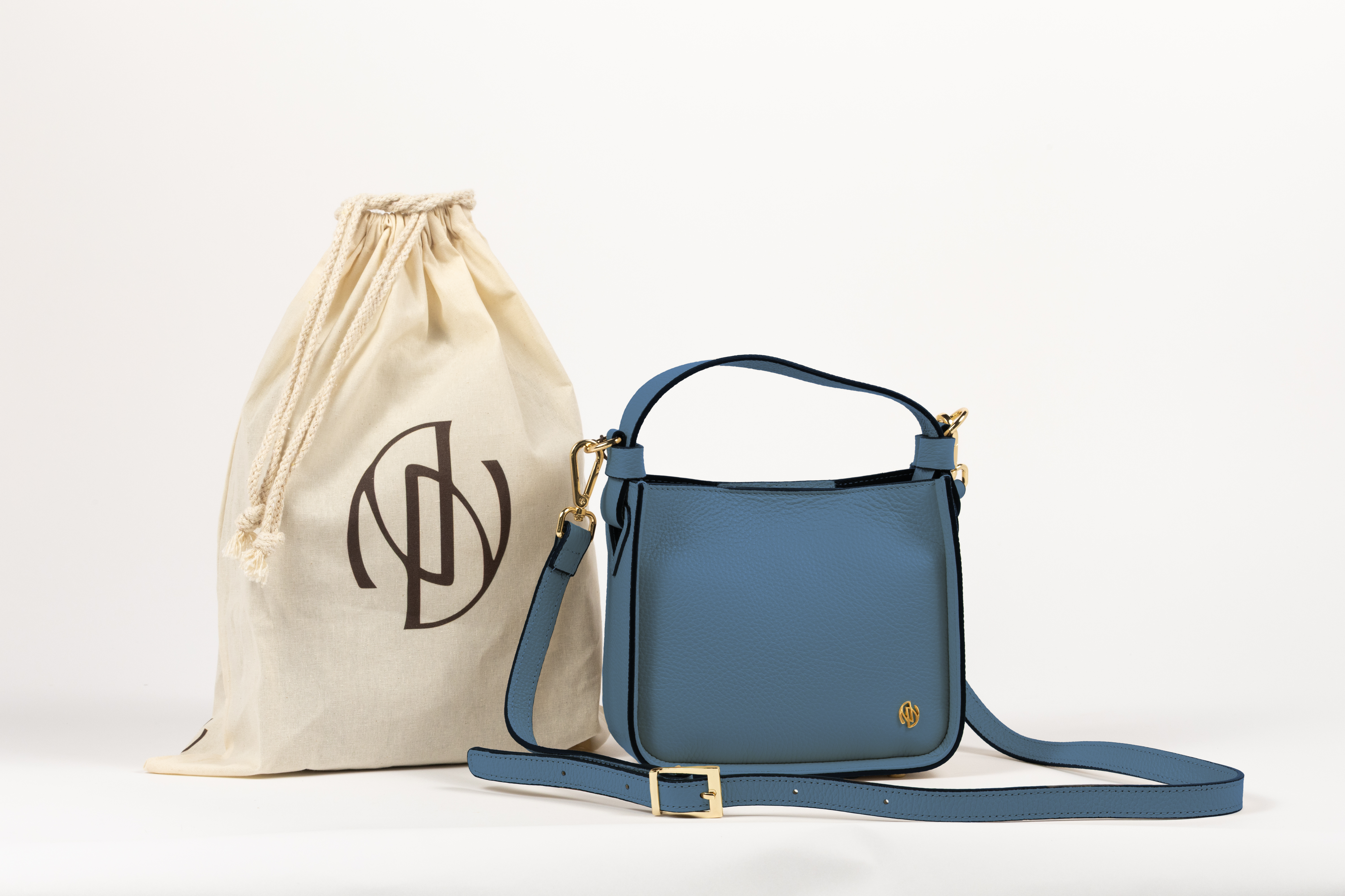 Affinée Élan Ocean handbag, with the branded dust bag and shoulder strap