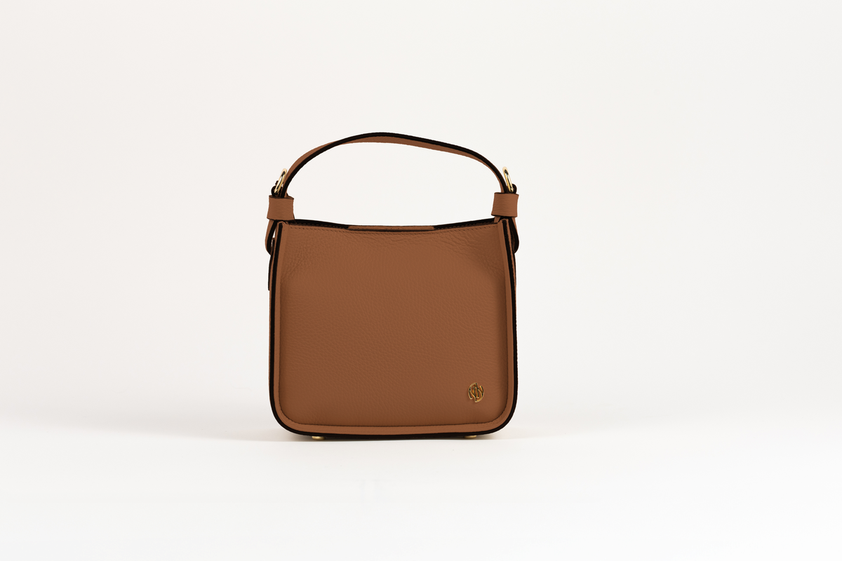 Affinée Élan Caramel handbag, straight front view with gold-tone monogram
