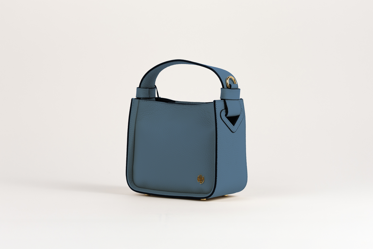 Affinée Élan Ocean handbag, front three-quarter view showing the opposite side
